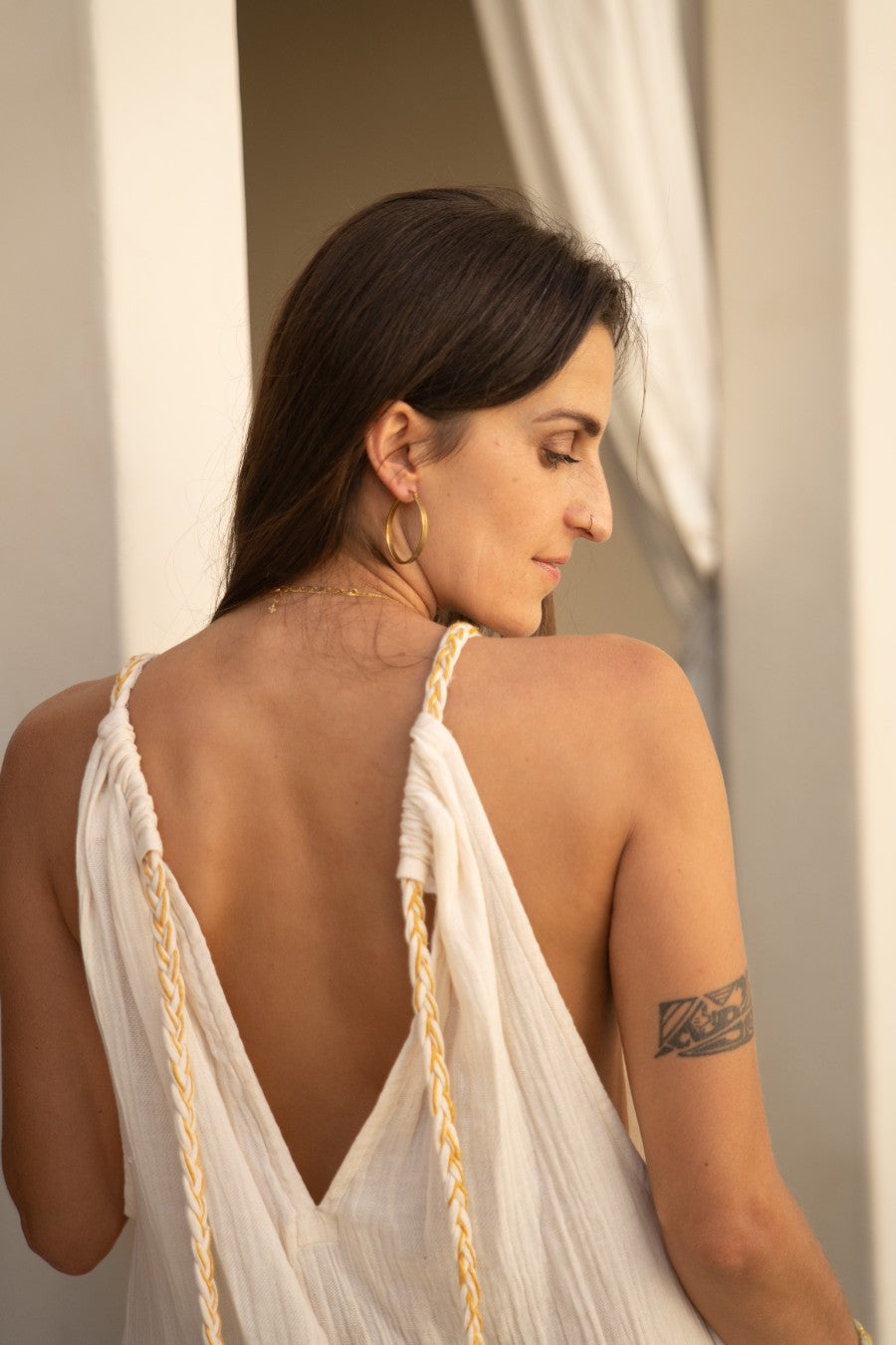 back view of the Delphi Dress — high neck organic crepe cotton dress with side slits